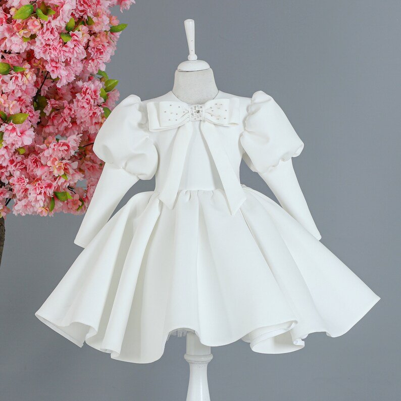 4c96a7f2470c6645 White Pearl Bow Princess Dress - Image 1